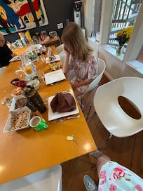 Beautiful breakfast area, prettily set table, amazing homemade granola and eggs! Fun people!