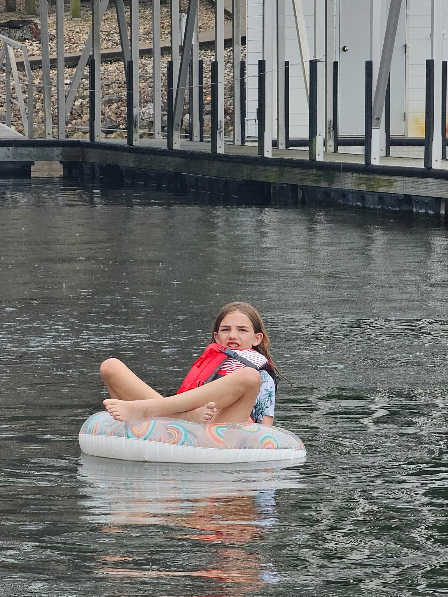 Only granddaughter floating along in the tube.