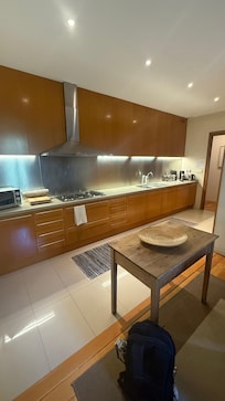 The kitchen has everything you need. The hidden dishwasher and fridge were great.