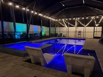 The beautiful heated salt water pool and spa at night. The lighting was very pretty.