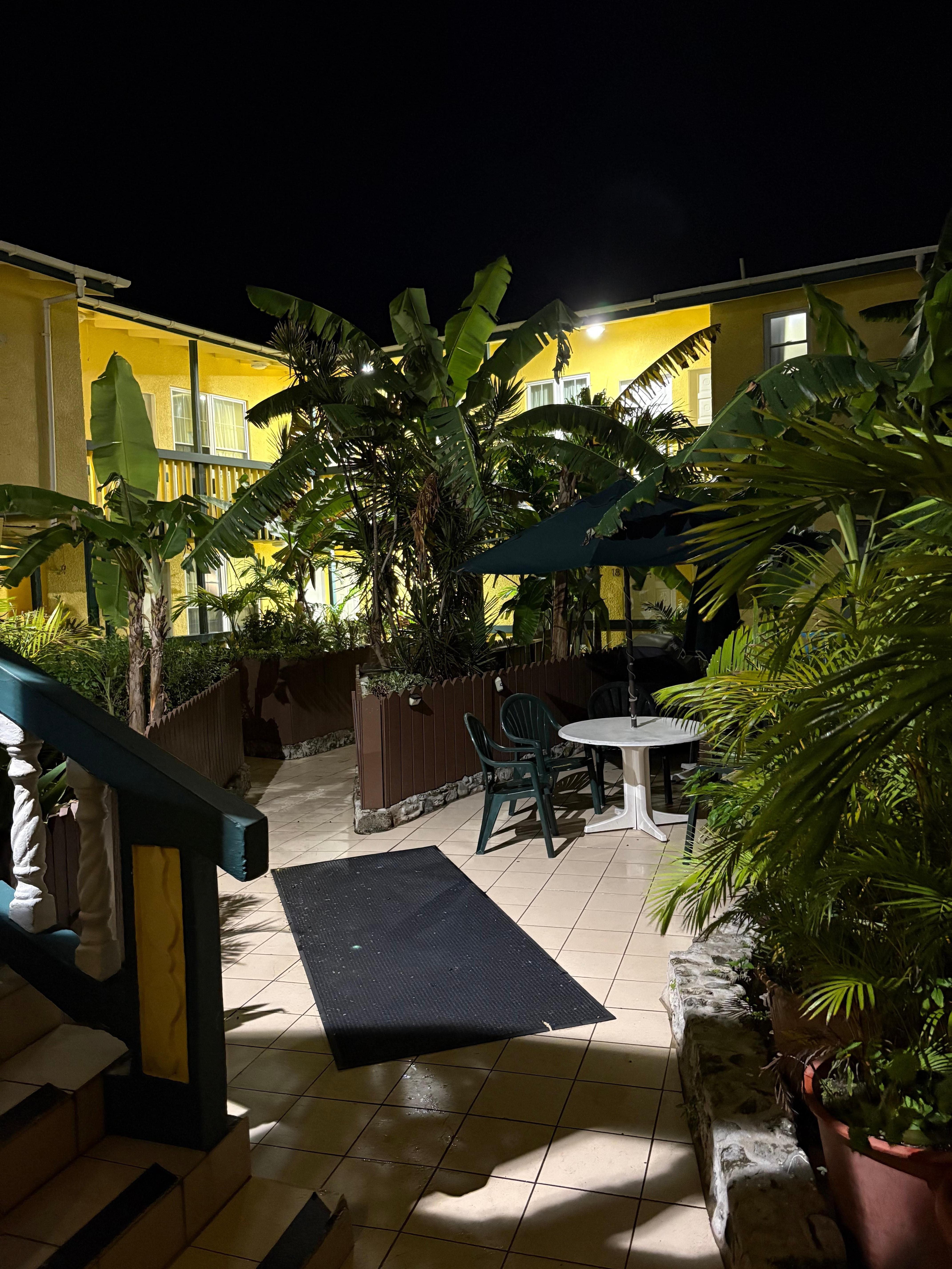 The courtyard for the garden rooms across the street