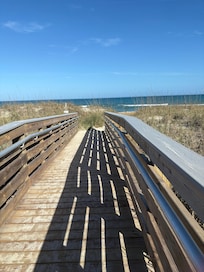 Boardwalk to beach is sturdy and connected to condos.