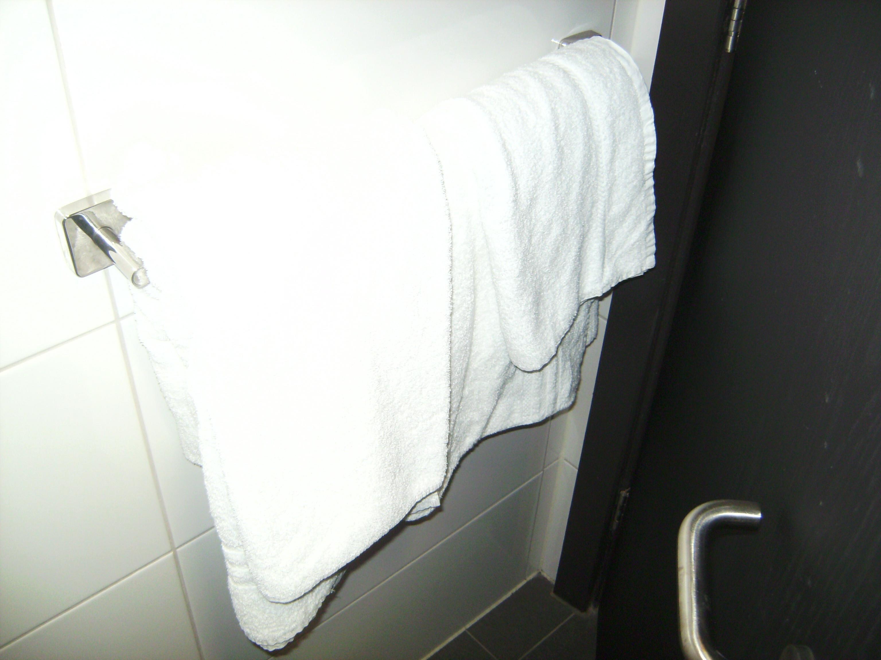 Lots of white fluffy towels behind the shower room door.  You may think at first 'No towels!' but they are hidden there.
