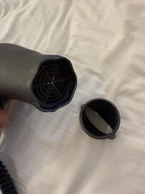 The hair dryer was burnt and I couldnât use the attachment