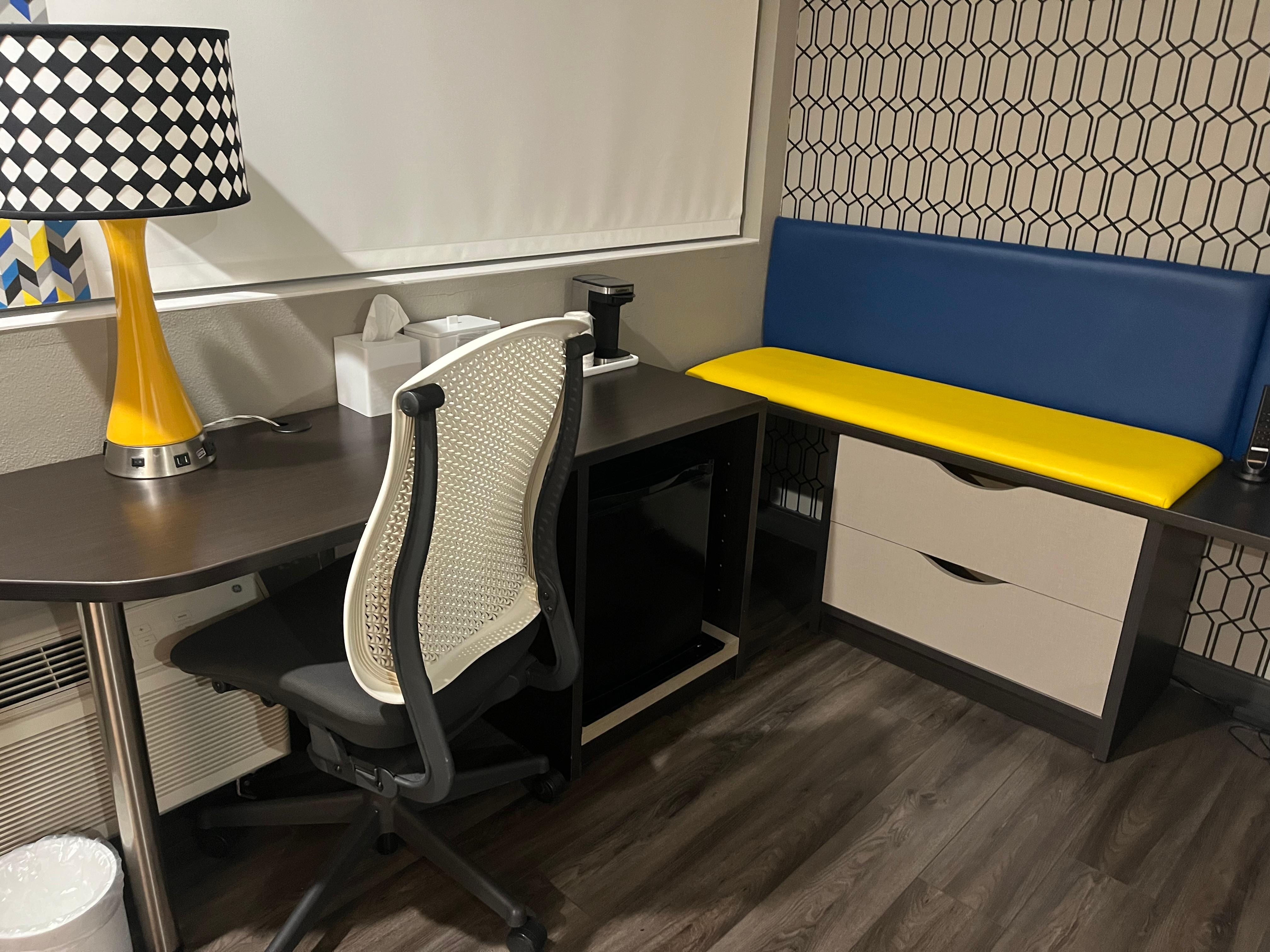 Fridge ,desk , microwave, iron and ironing board 