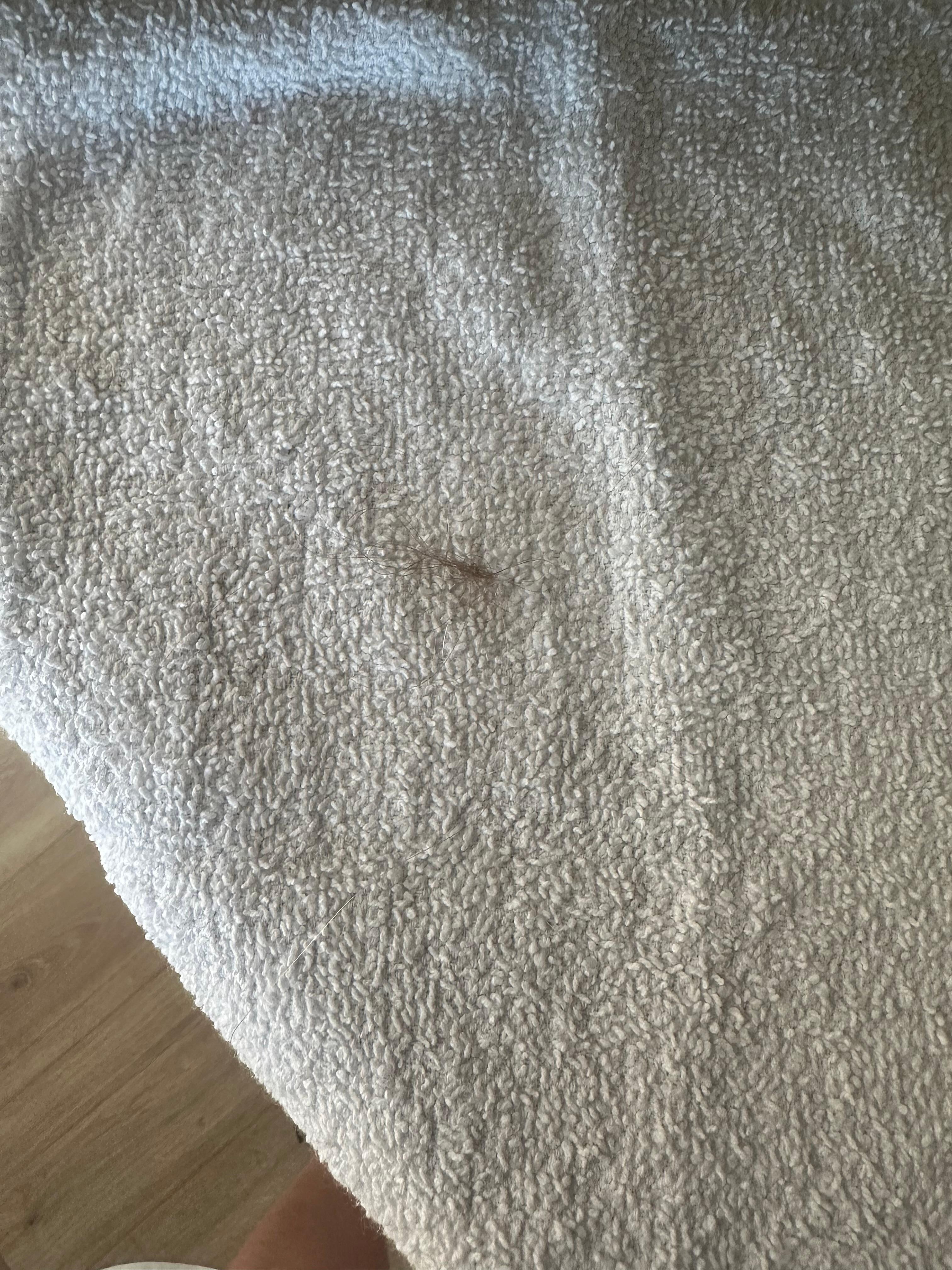 Dirty towel pulled from cabinet to use in bathroom.