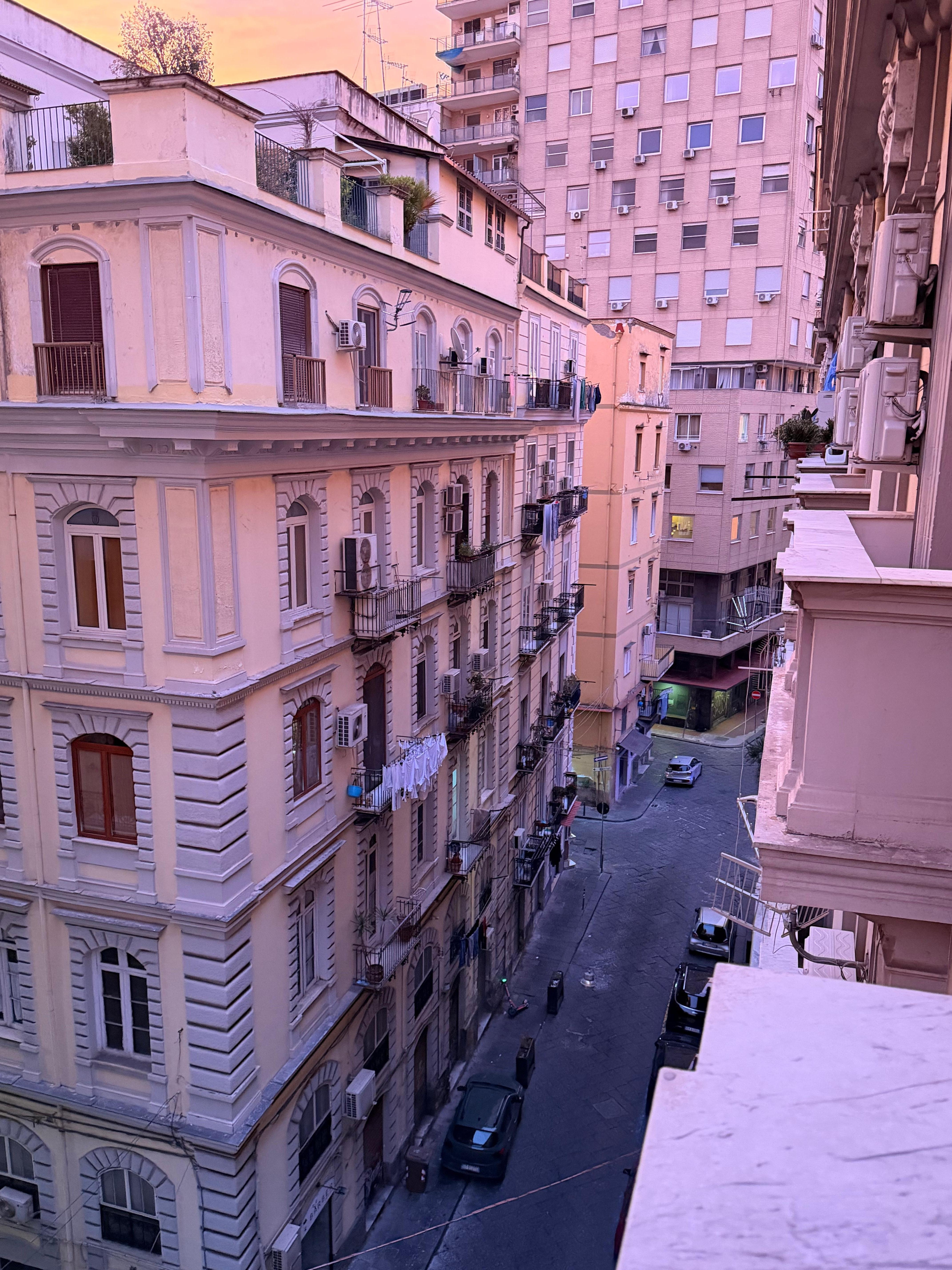 Balcony view of the side street below. 