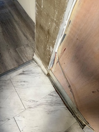 Example of DIY, dirty cupboards, and wires everywhere.