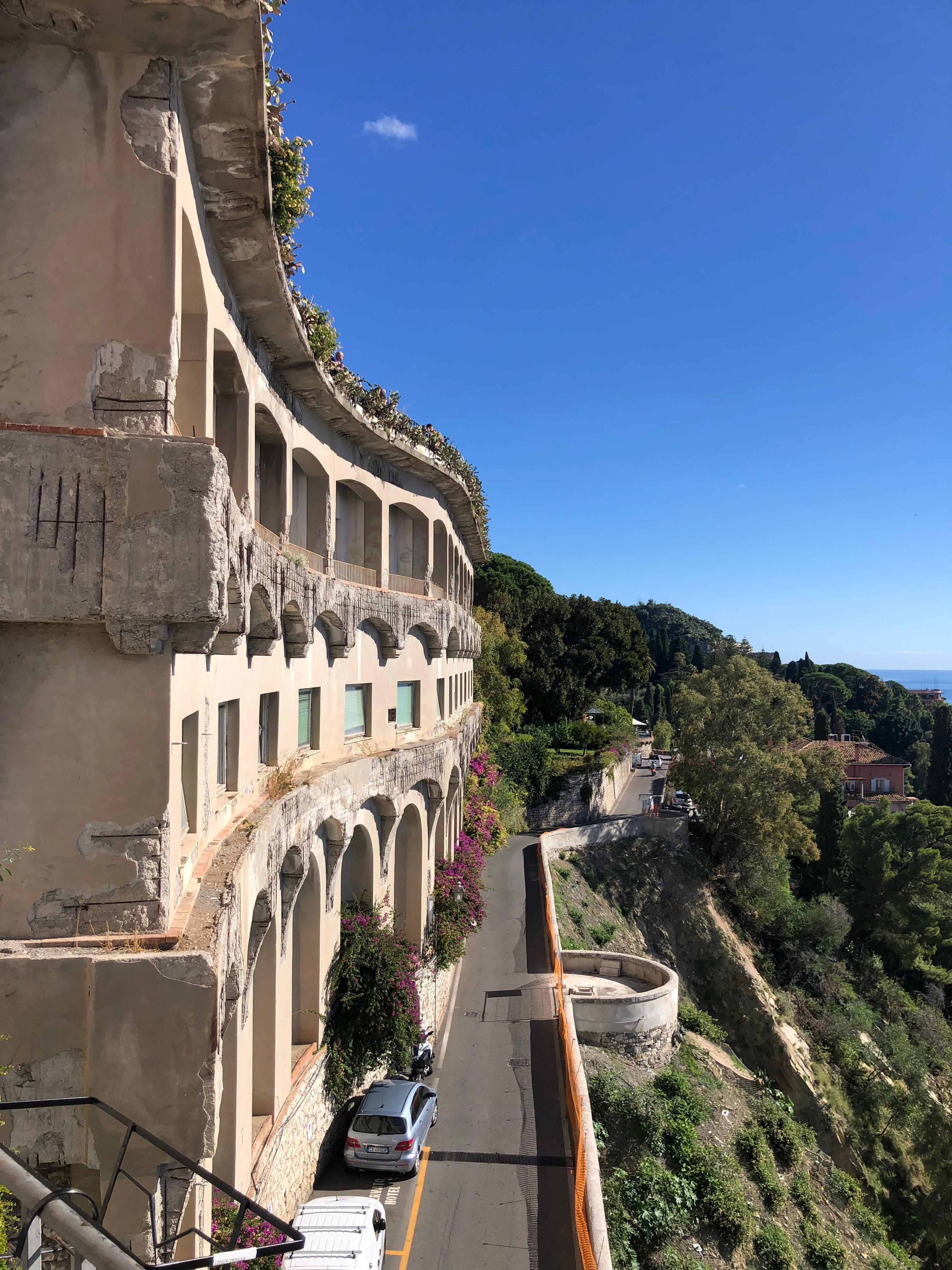 The road below the hotel, where taxi pickups happen