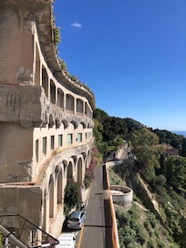 The road below the hotel, where taxi pickups happen