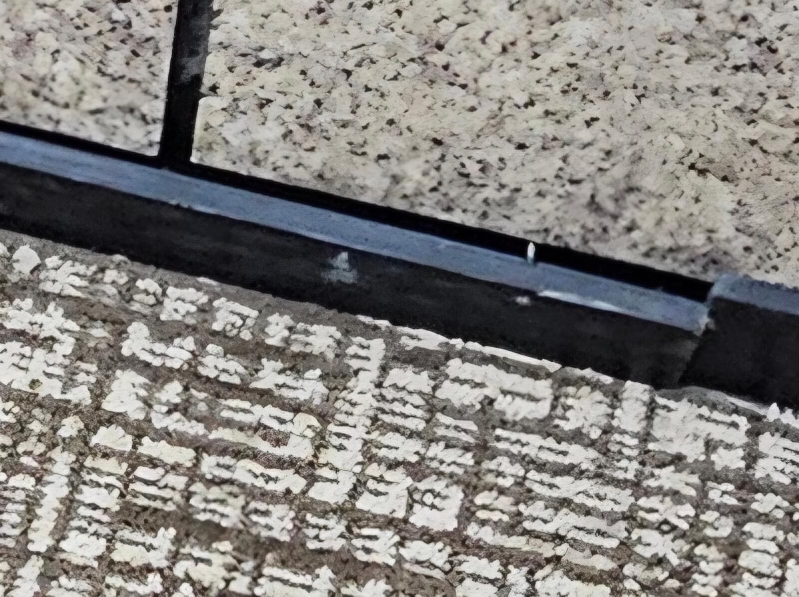 Broken baseboard in elevator