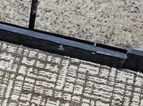 Broken baseboard in elevator