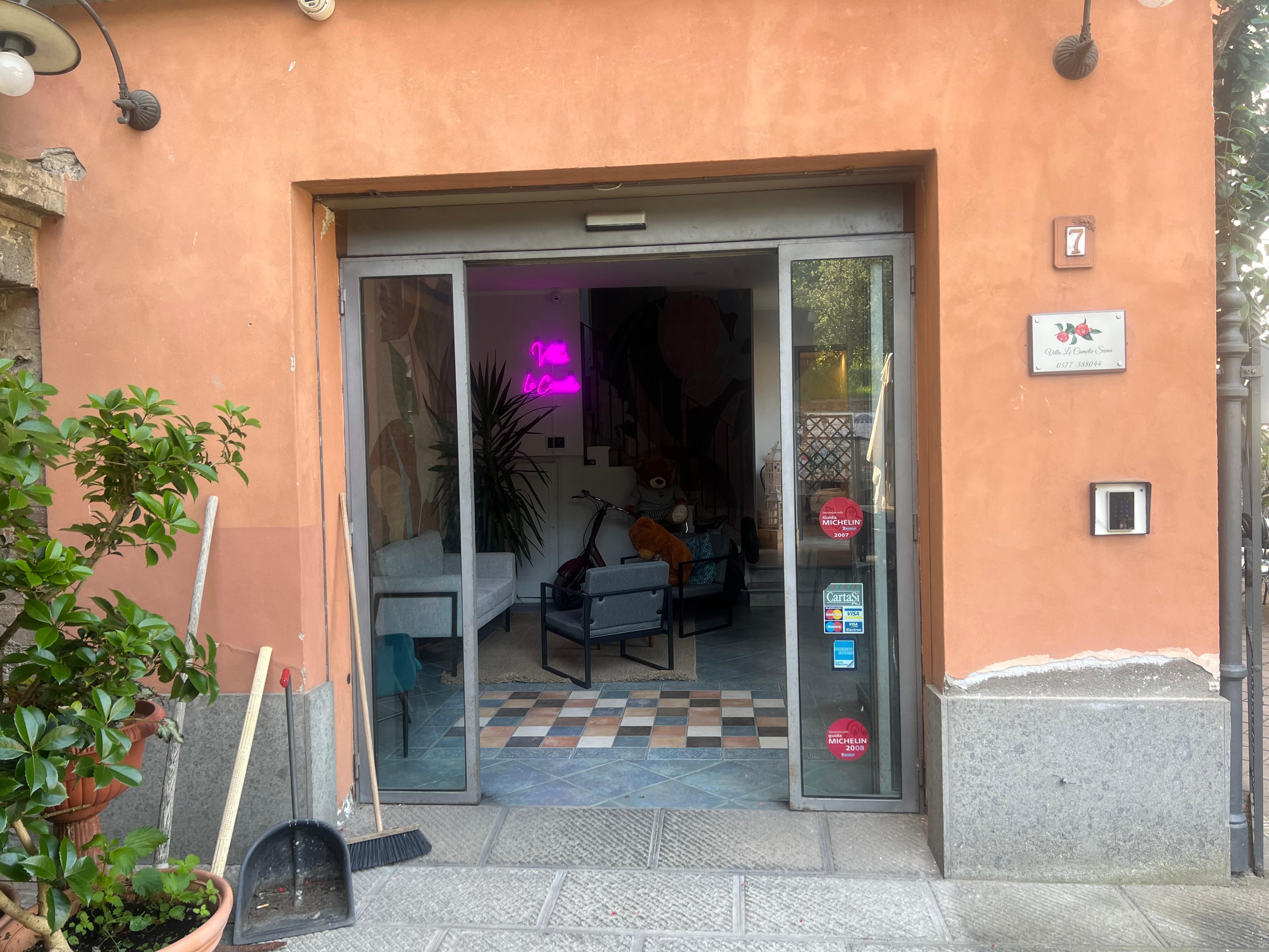 The front entrance and small lounge. 
