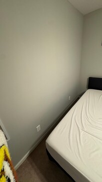 Scuffing wall in second bedroom.