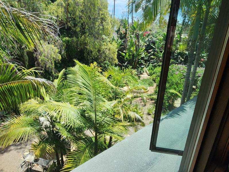 Tropical landscaping visible from every window. The property is amazing!