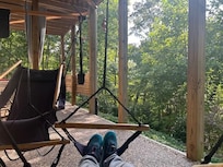 Awesome swing chairs to chill in beneath the deck next to the hot tub.