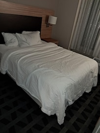 How we arrived back to our room to find our bed, after the bed skirt was taken off. We never once even laid in the bed.