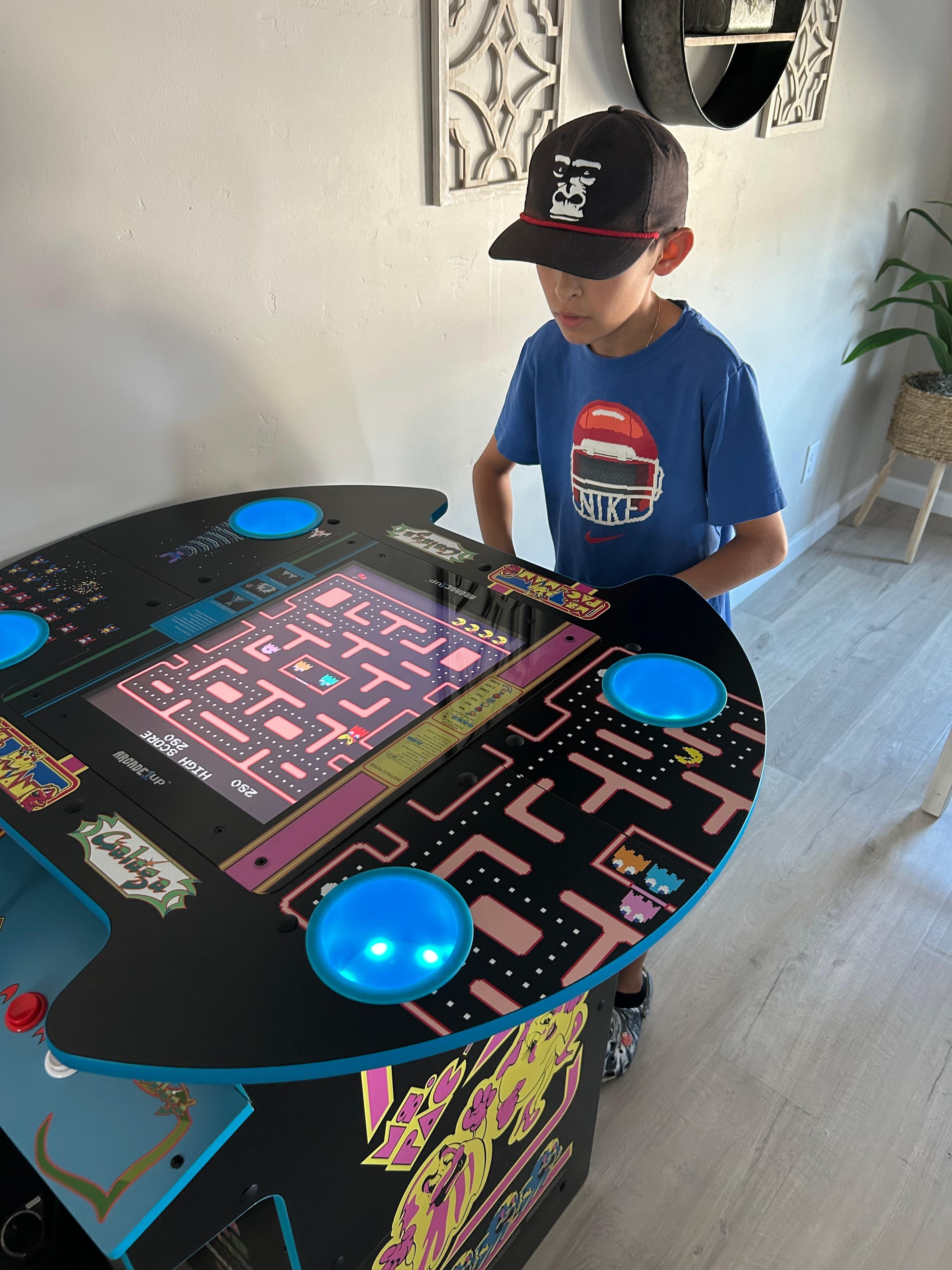 My 10 year old playing PAC-MAN