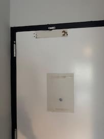No exit diagram or automatic door closer