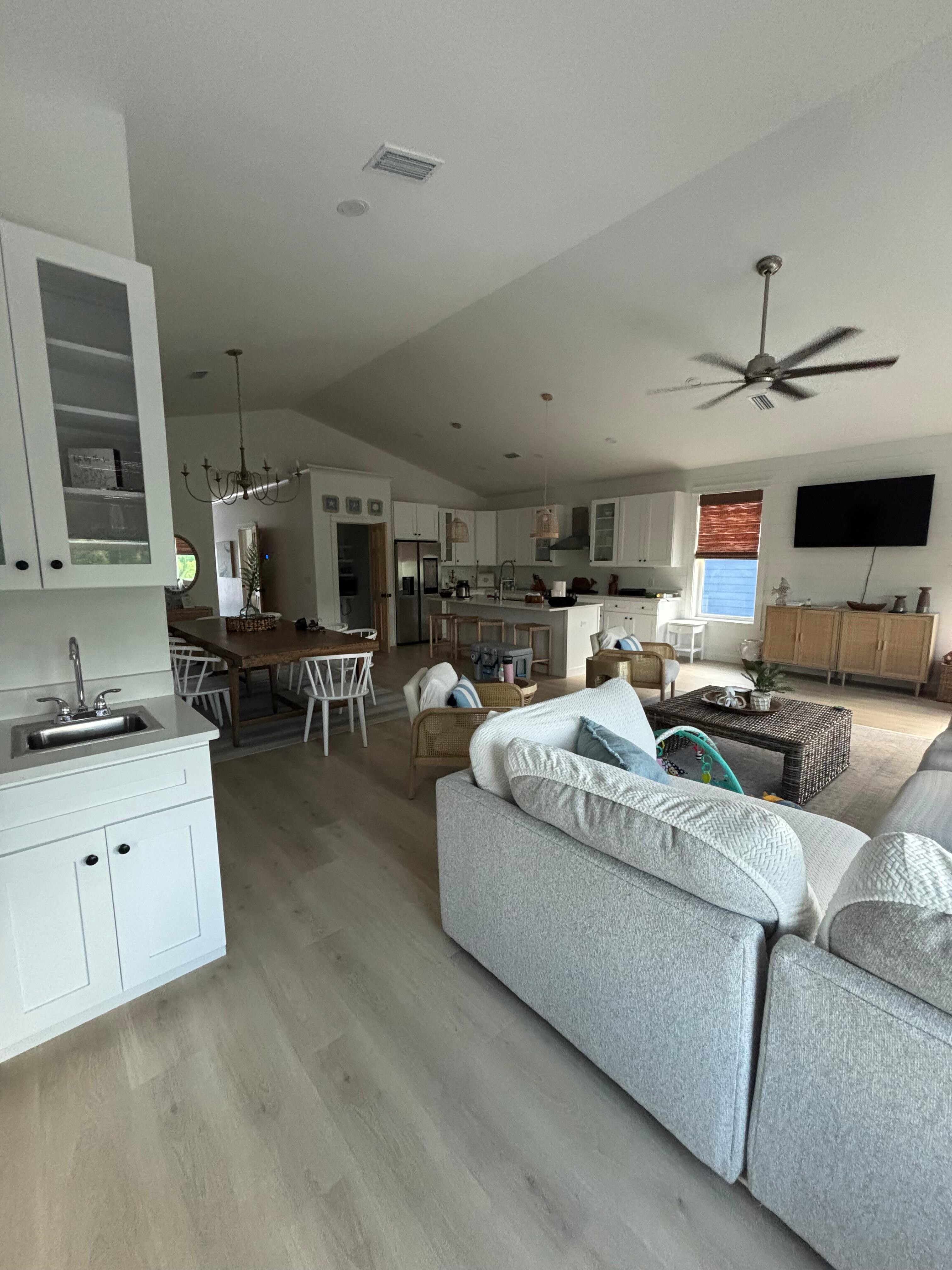 Open floor plan living space. The couch is so comfortable with lots of space. 