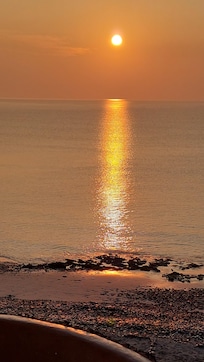 Beautiful sunrises from our ocean view apartment