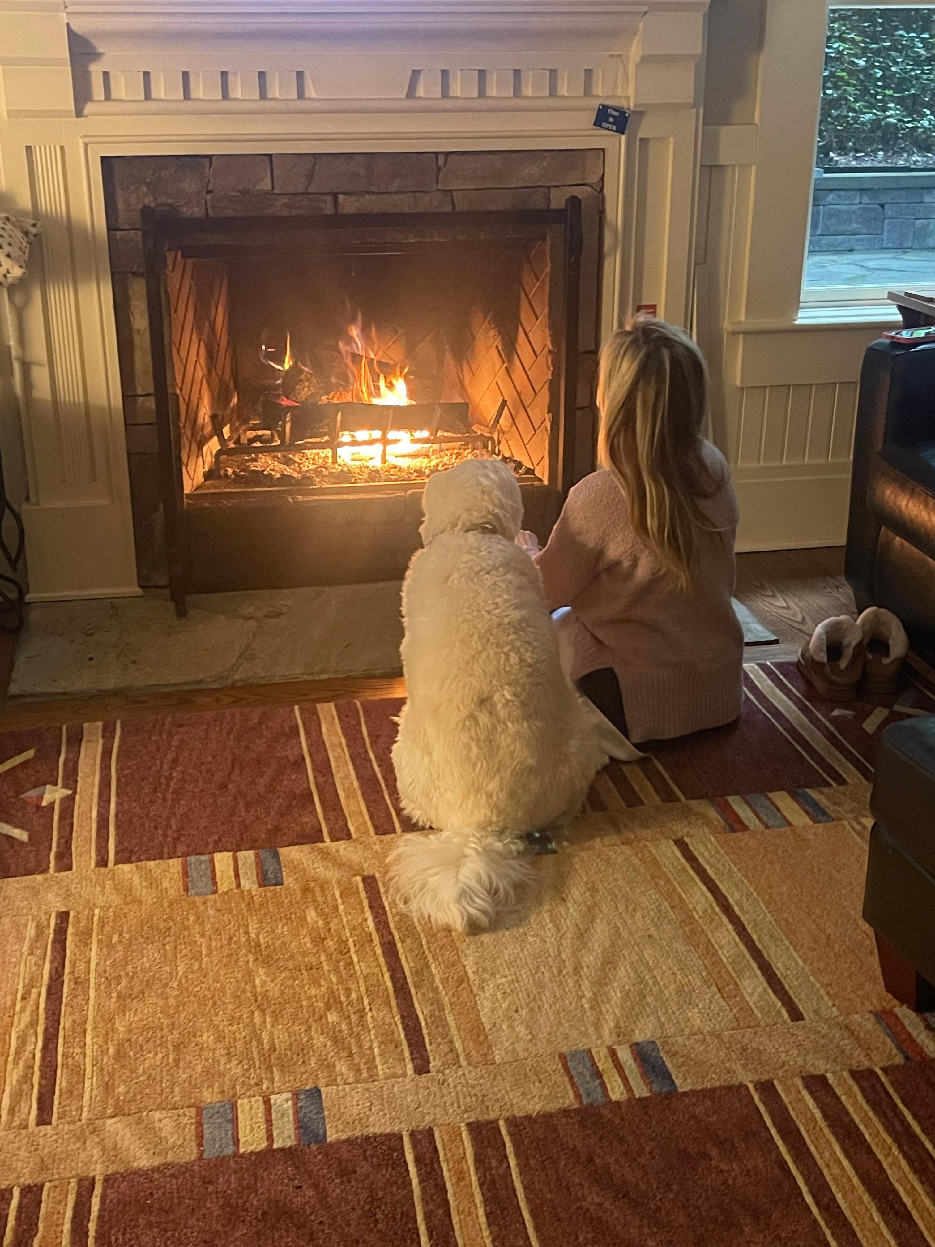 My wife and Bailey enjoying the fireplace