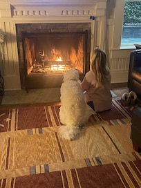 My wife and Bailey enjoying the fireplace