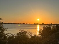 Sun rising over the lake