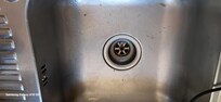 No kitchen sink plug or waste disposed.Stained aluminum bowl.
