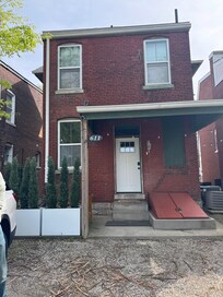 Back entrance with parking- big pro was off street parking!