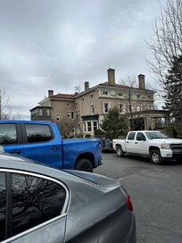 Carriage house is part of a larger property where the owners also live. Nice grounds and neighborhood to walk.