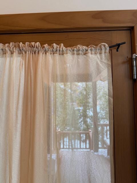 Broken curtain rod.  Every time you opened the door or brushed by the curtain it would fall off.