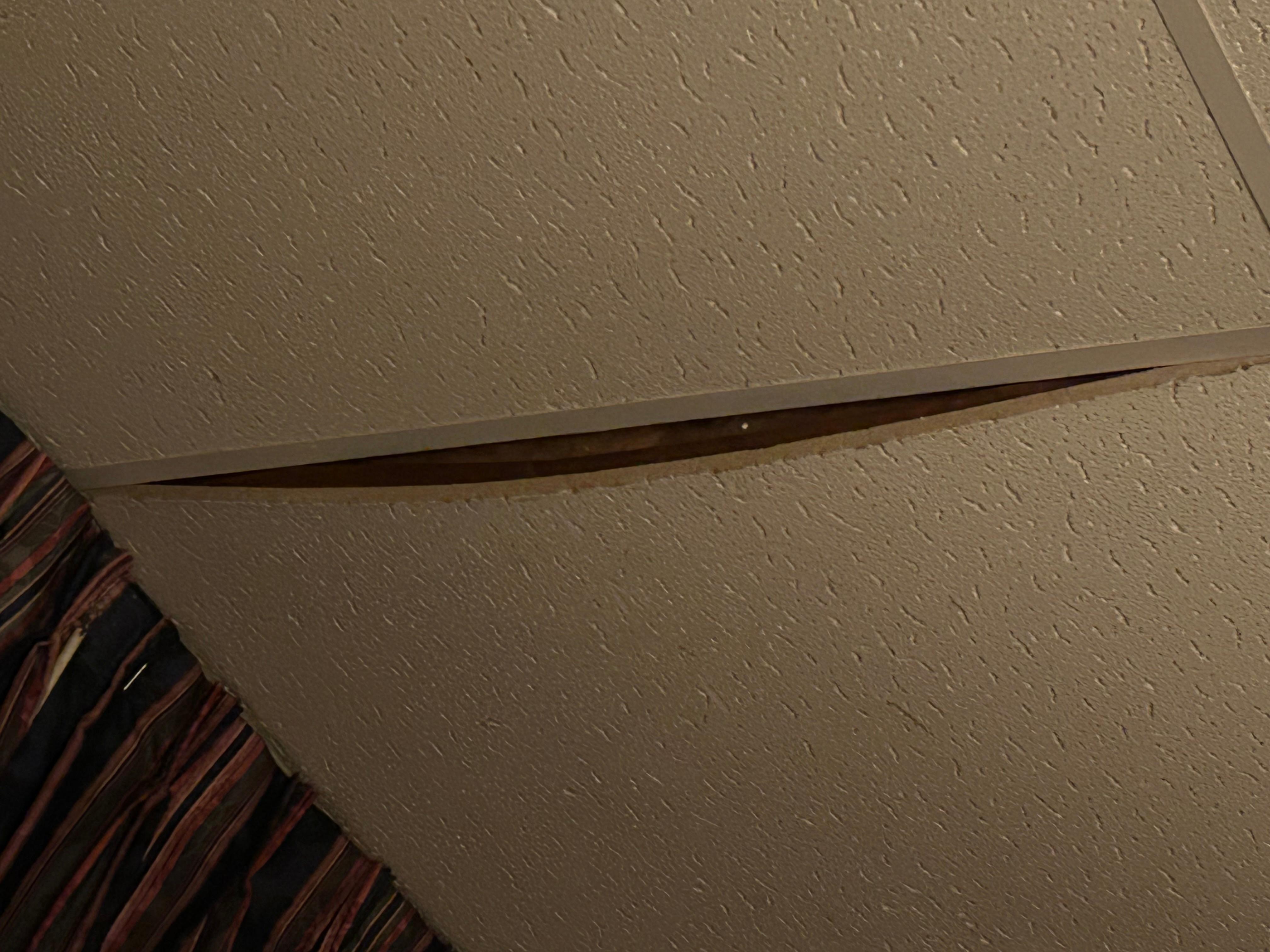 Ceiling tile ready to fall !!