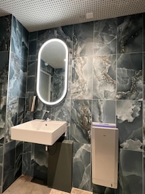 Public toilet in reception/pool area