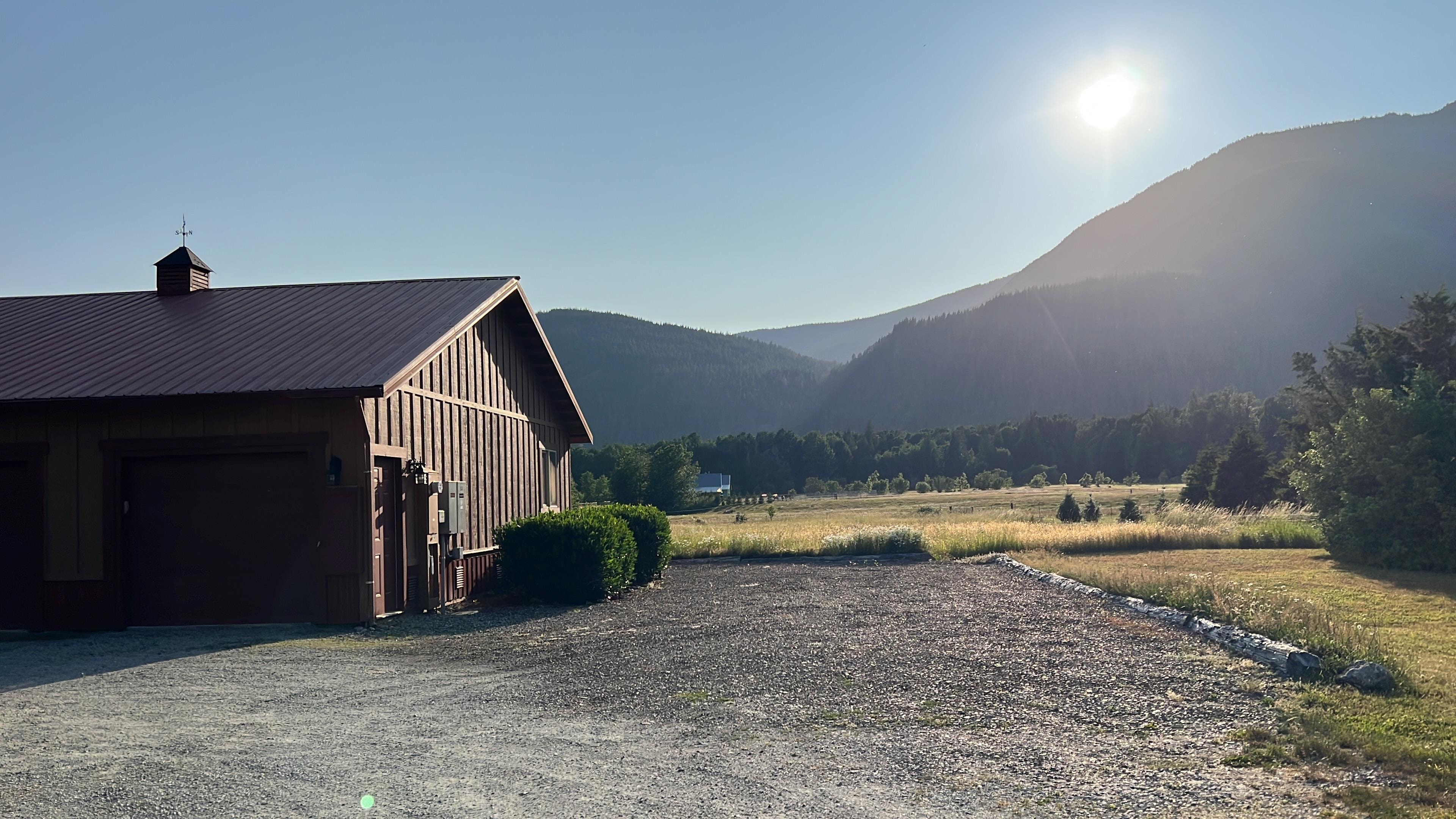 View of detached garage unit with breathtaking views of mountains.