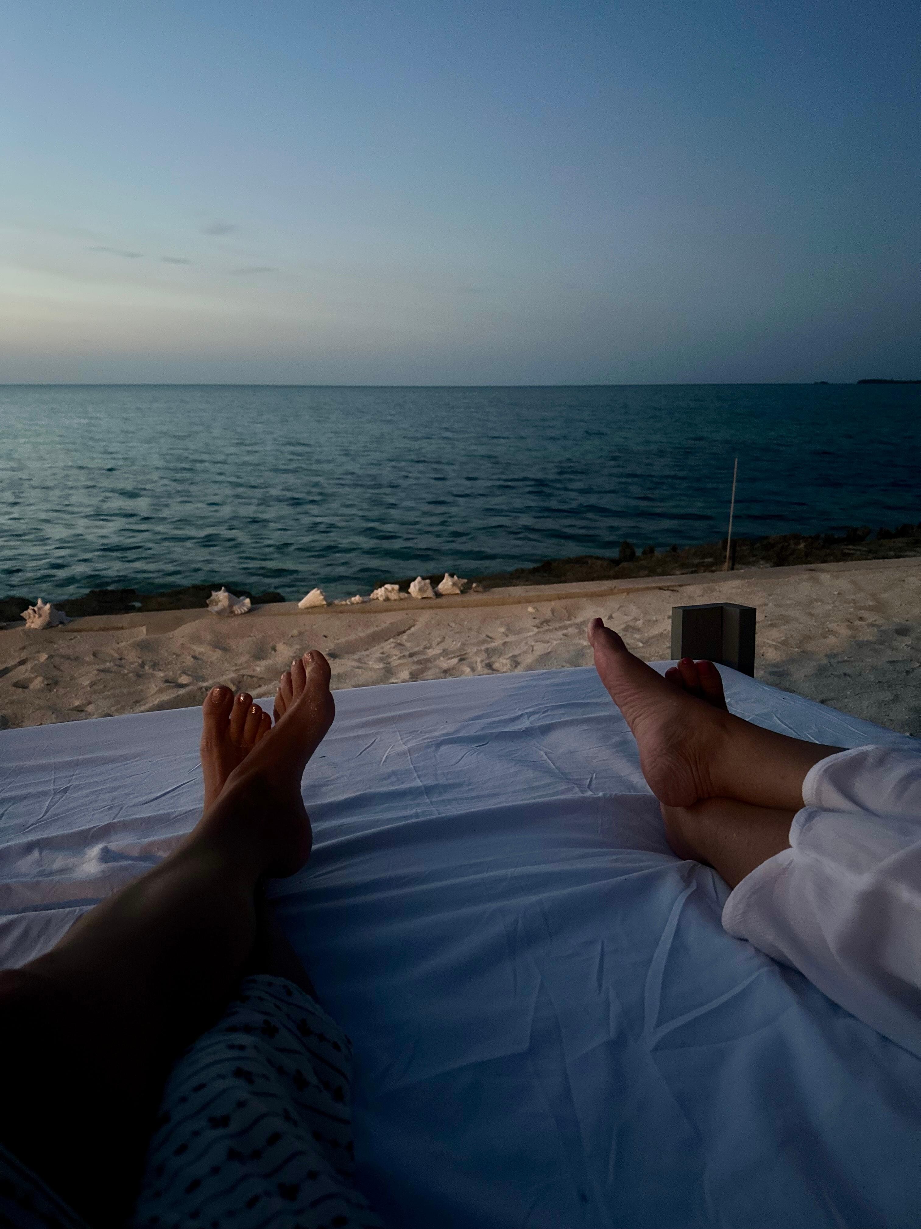 Lying on one of the beach beds enjoying the evening breeze.