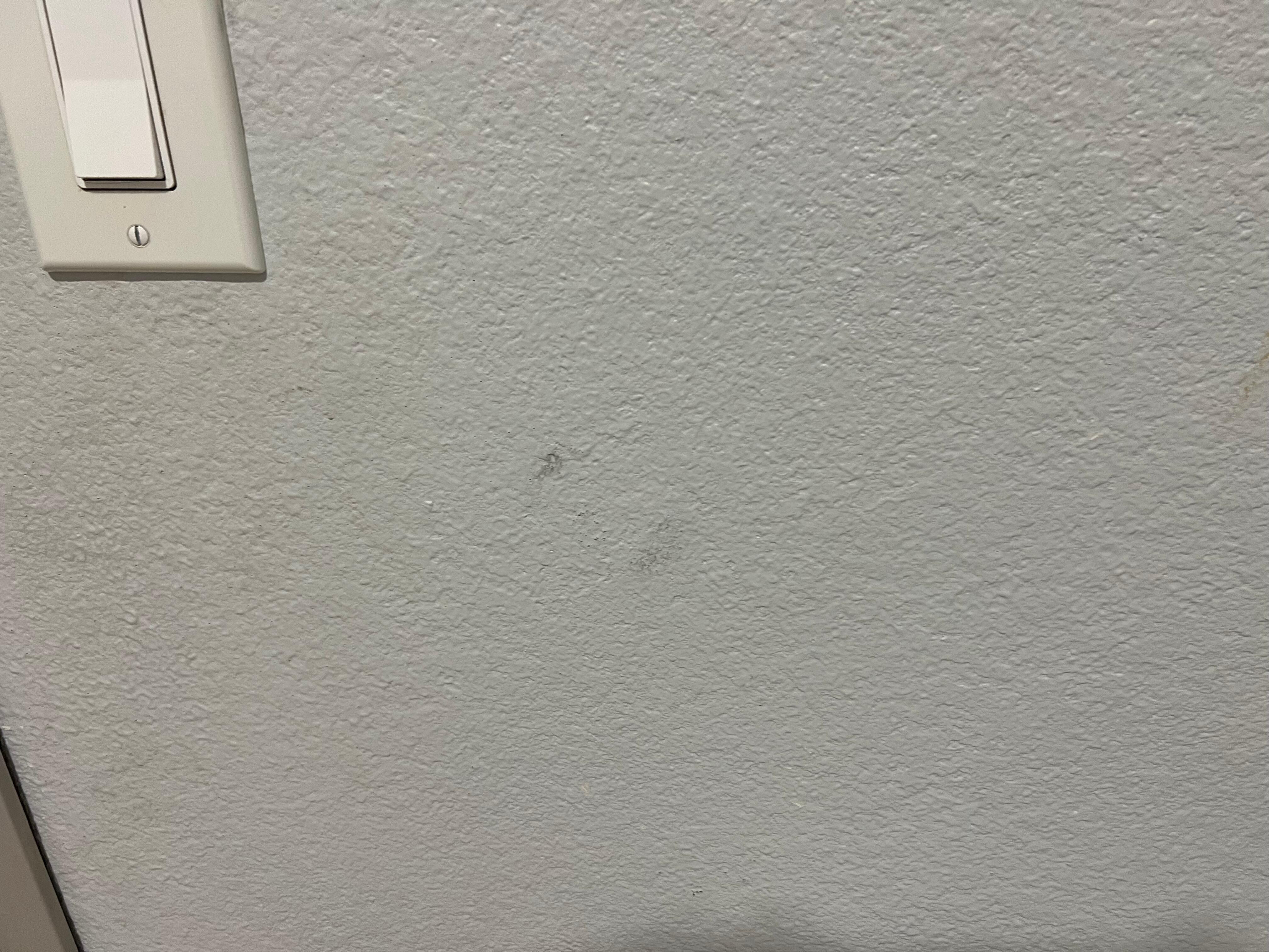 Unknown liquid stains on wall