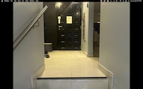 Concrete dust inside of building, this is after mopping up much of it.