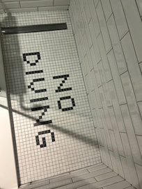 Cool mosaic detail on shower floor