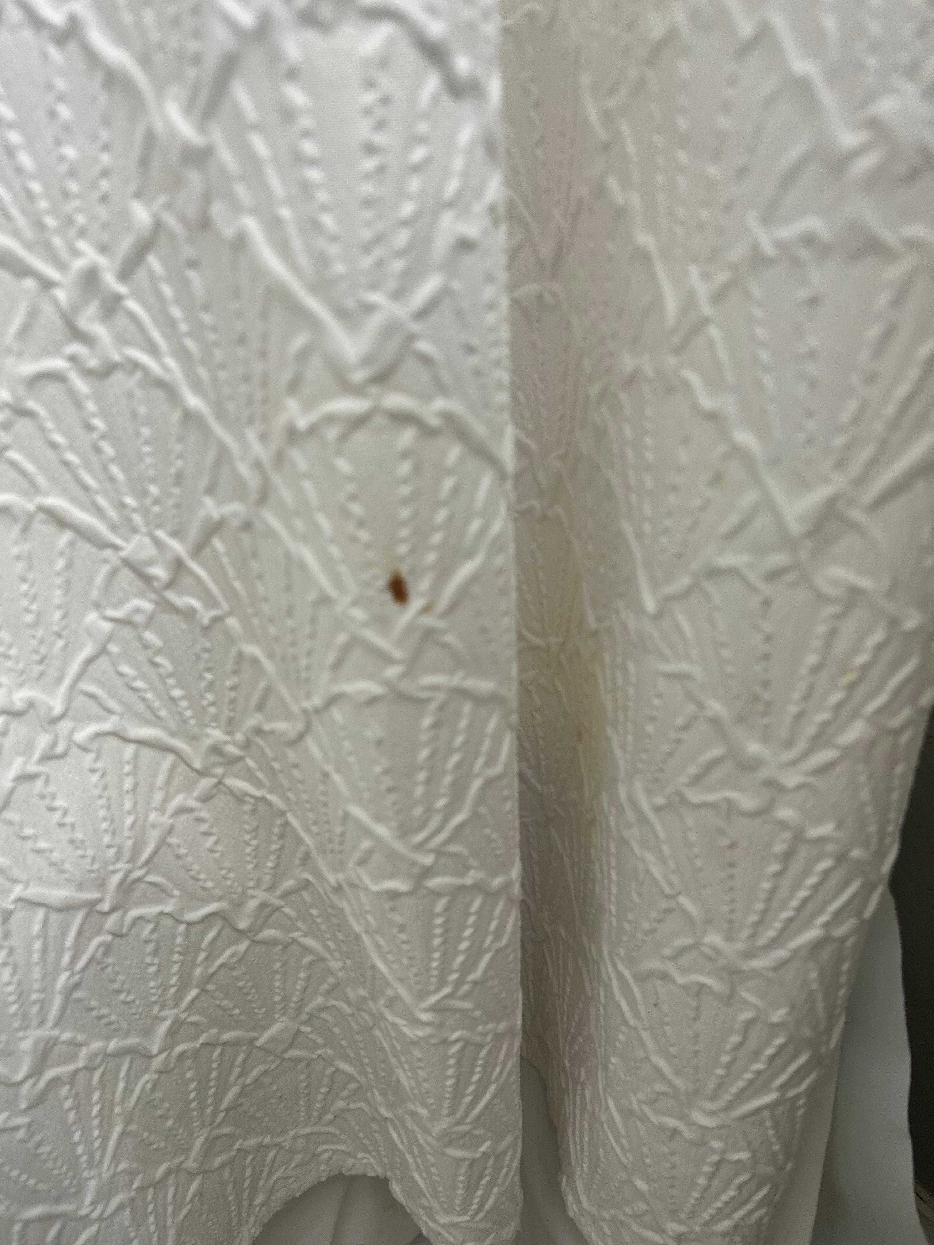 Goo on shower curtain 