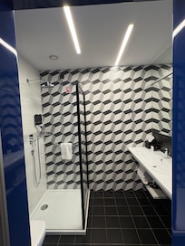 The bathrooms are modern and luxurious.