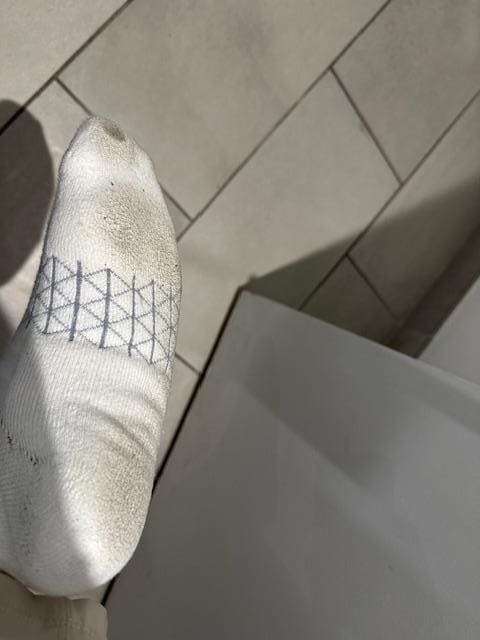 Walking around the room my socks would get filthy