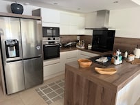 Integrantes kitchen fully equipped.