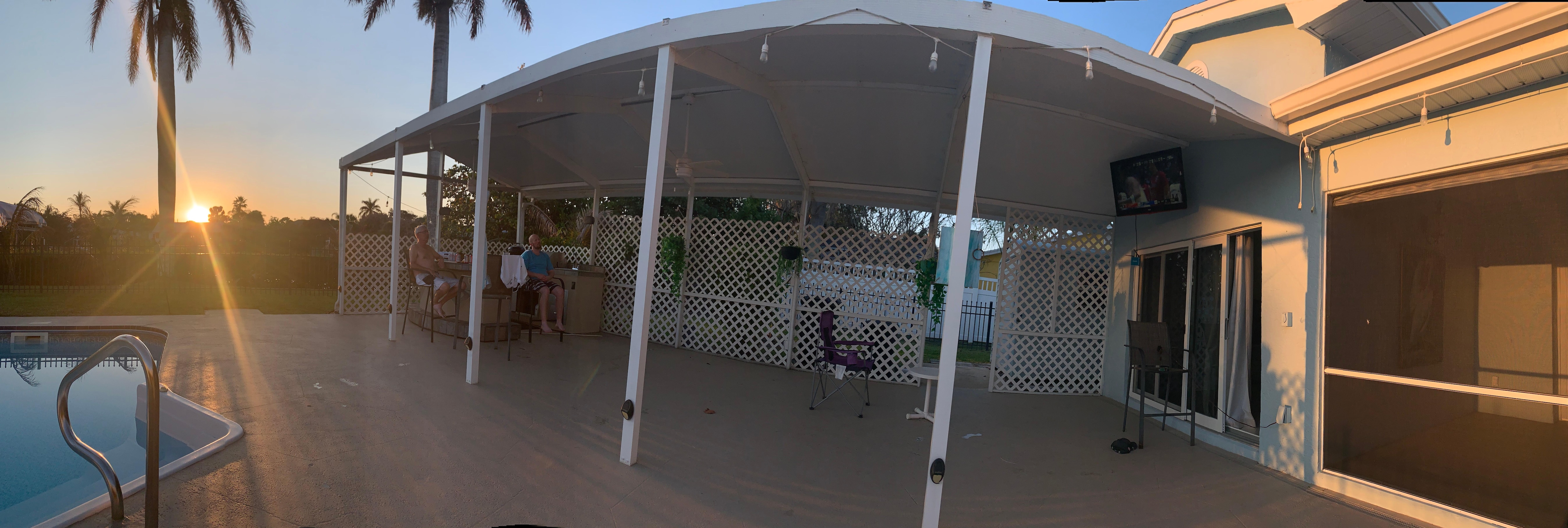 Watching NCAA basketball on a beautiful afternoon by the pool!