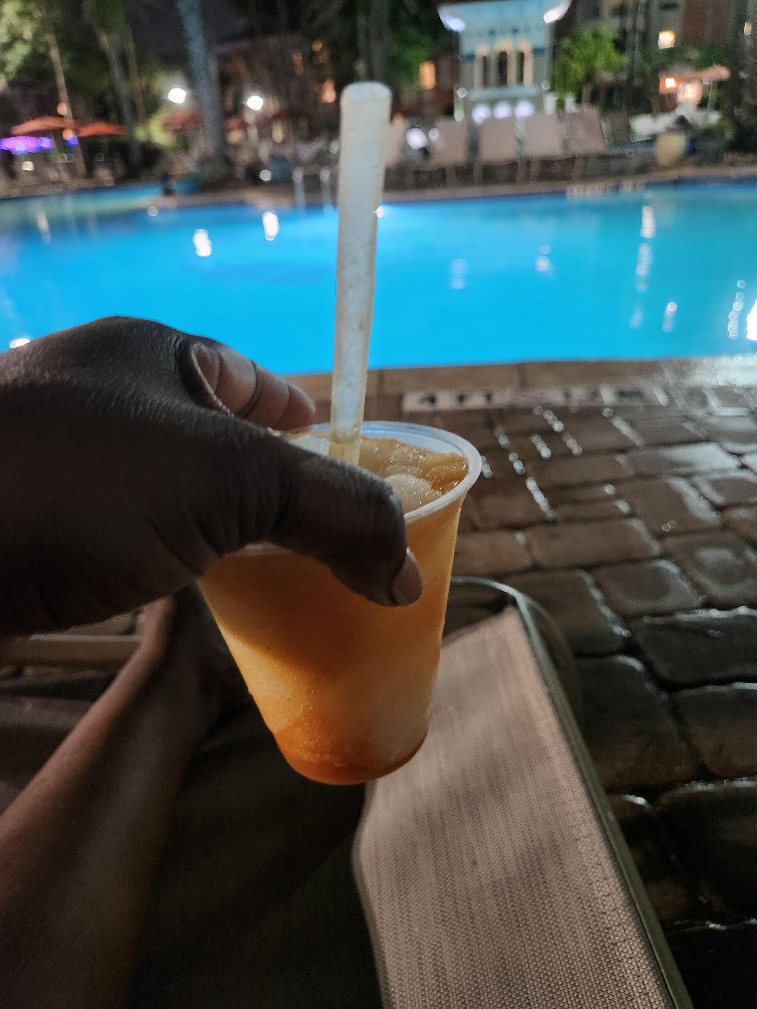 Poolside with a mixed drink