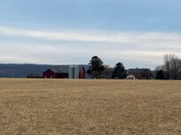 View of farm to show it is surrounded by fields and peaceful