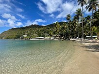 Beach at the Marigot Bay hotel. Shallow water but some nice fish around the rocks at the end.