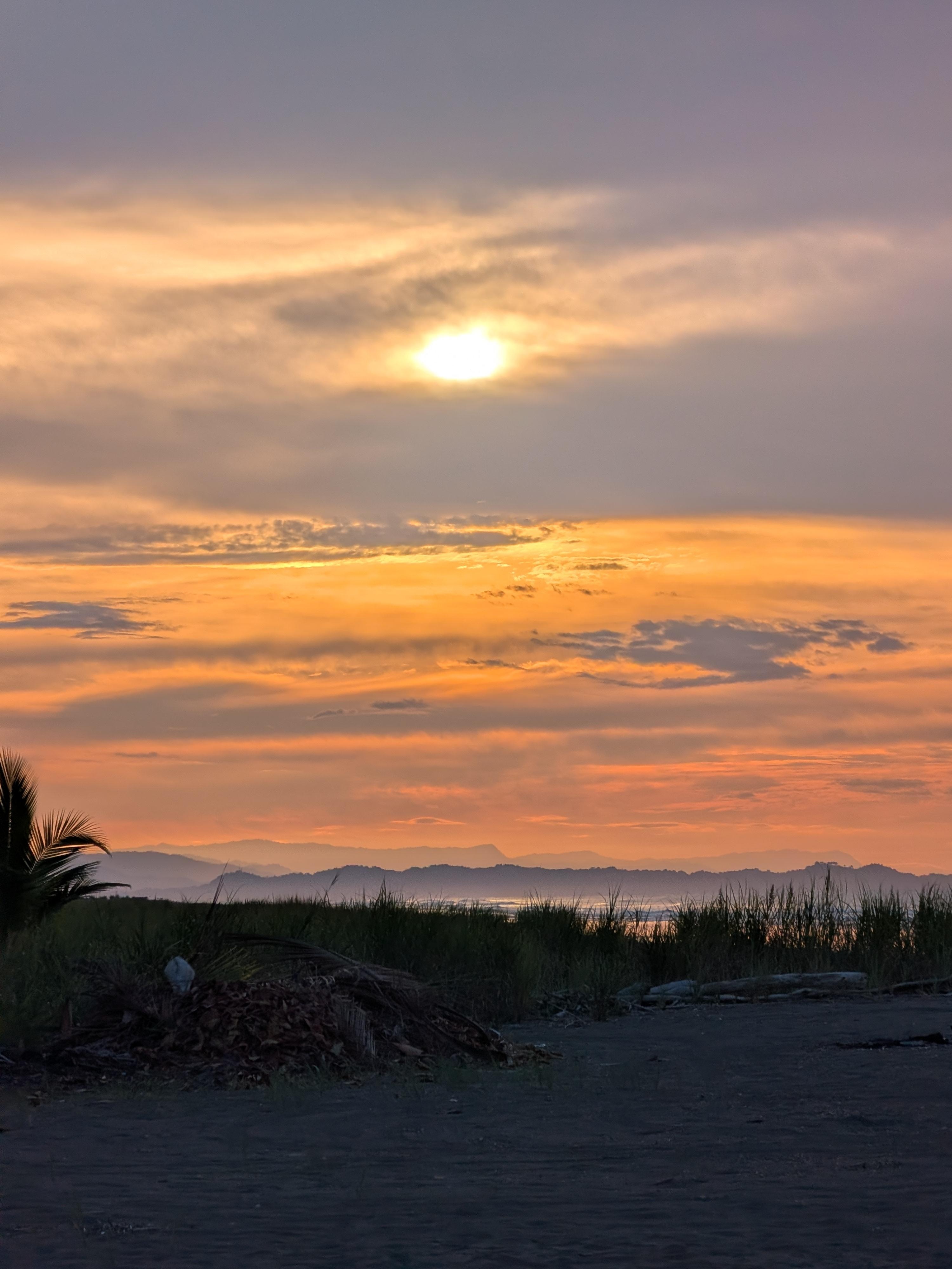 The sunrise over Manuel Antonio/Quepos area on our final morning walk on the beach. 
