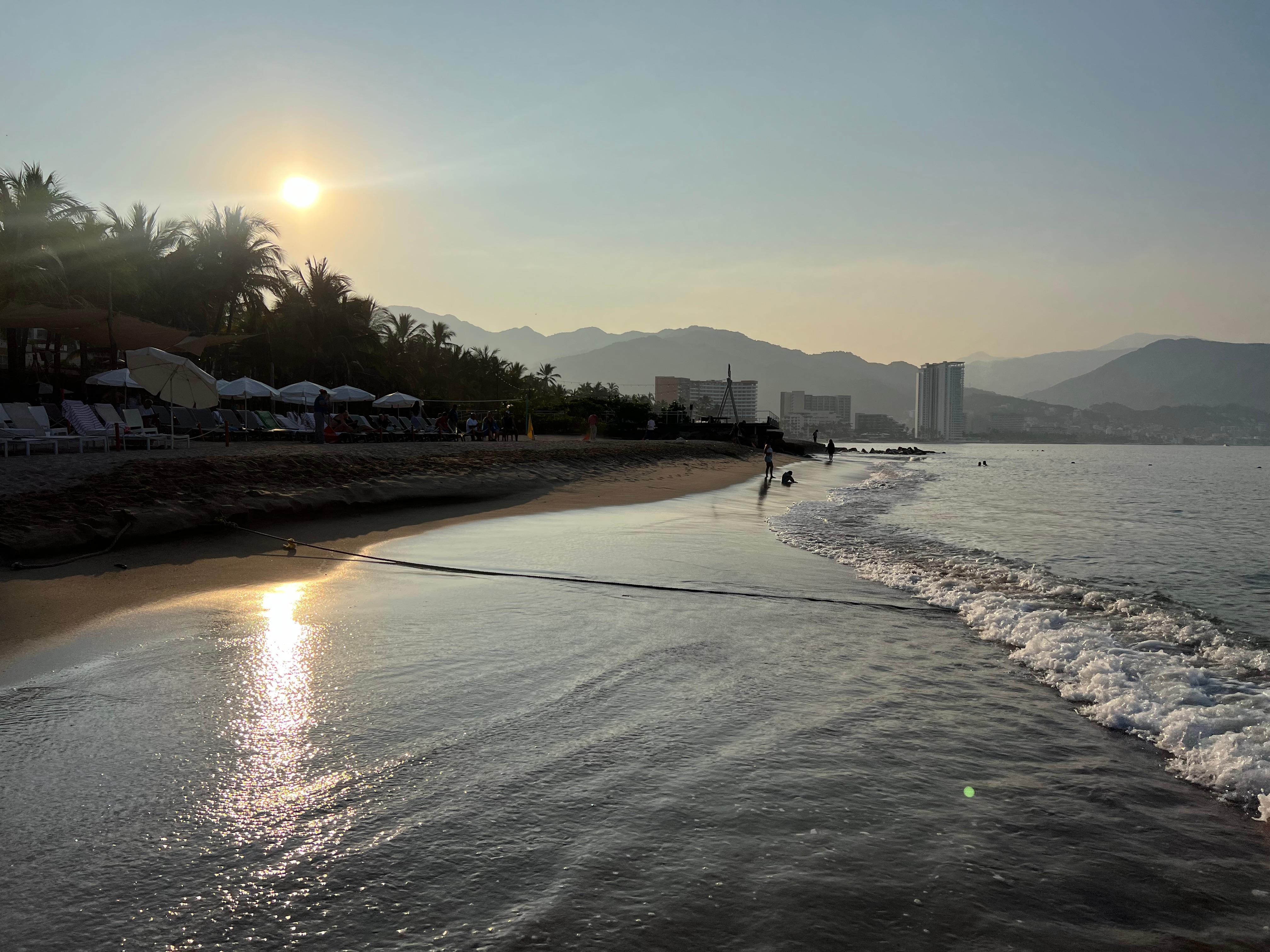 After watching the sunrise, I go for a swim in the ocean and then have an amazing breakfast buffet fresh fruit very huge selection of good food