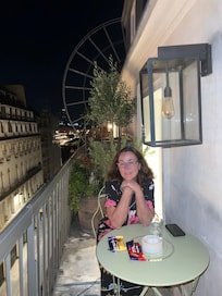 Balcony of hotel , Ferris wheel at the Louvre was being dismantled the day after we arrived.